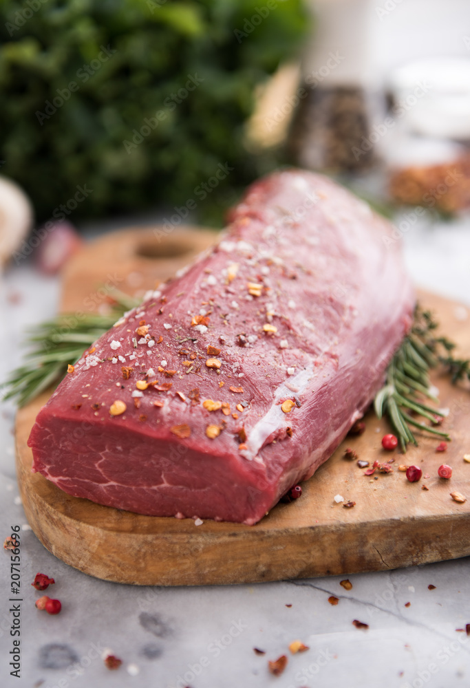 Beef Tenderloin on Wooden cutting Board Beef Tenderloin on Wooden cutting Board
