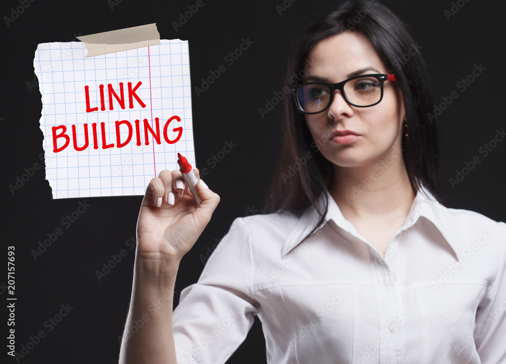 The concept of marketing, technology, the Internet and the network. A young businessman shows what is important for business: Link building The concept of marketing, technology, the Internet and the network. A young businessman shows what is important for business: Link building
