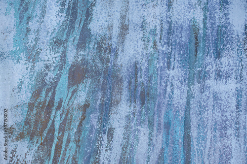 close up of faded abstract blue textured paint streak pattern © driftwood