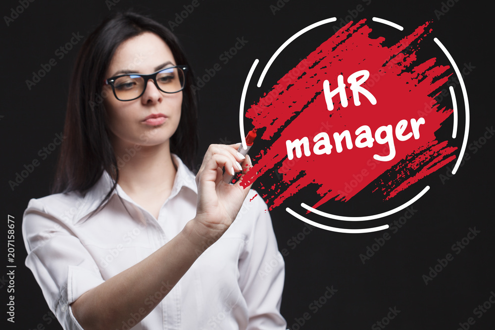 The concept of marketing, technology, the Internet and the network. A young businessman shows what is important for business: HR manager The concept of marketing, technology, the Internet and the network. A young businessman shows what is important for business: HR manager