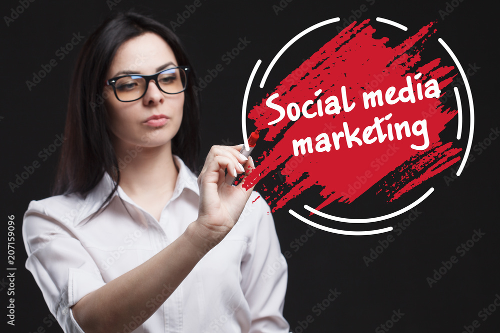 The concept of marketing, technology, the Internet and the network. A young businessman shows what is important for business: Social media marketing The concept of marketing, technology, the Internet and the network. A young businessman shows what is important for business: Social media marketing