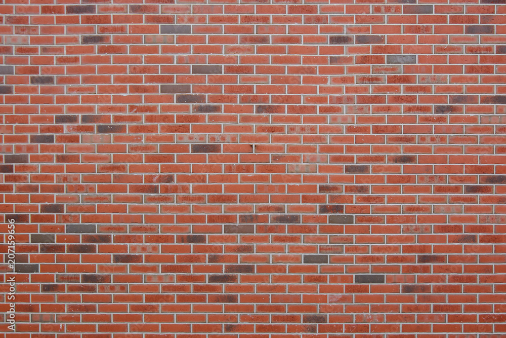 Fototapeta premium Red brick wall with elements of black