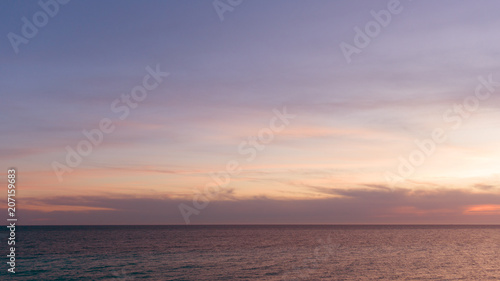 Majestic sunset over calm water. © Gray wall studio