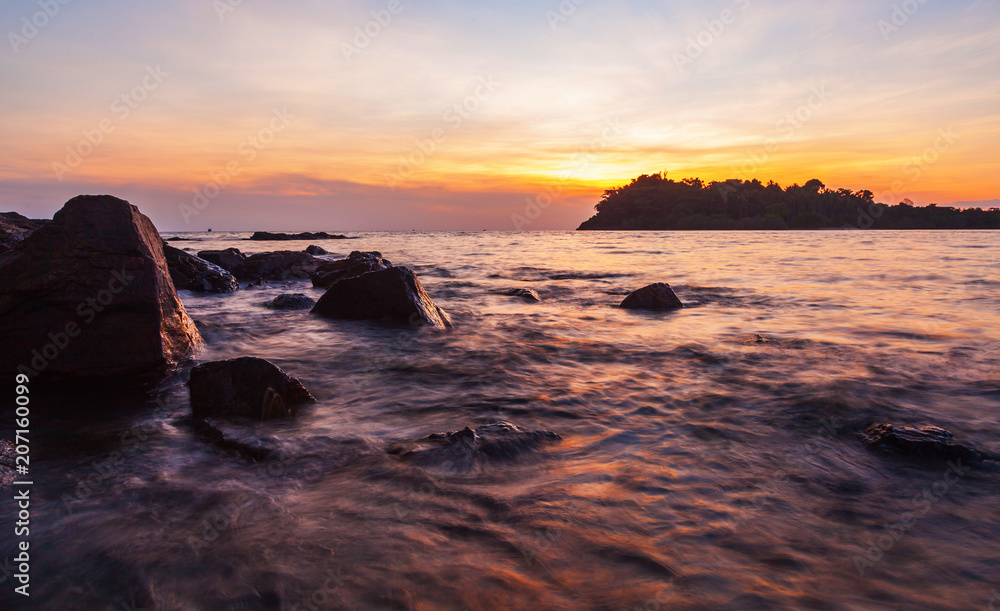 Tropical sea beach at sunset twilight, Koh Change island, Thailand Tropical sea beach at sunset twilight, Koh Change island, Thailand