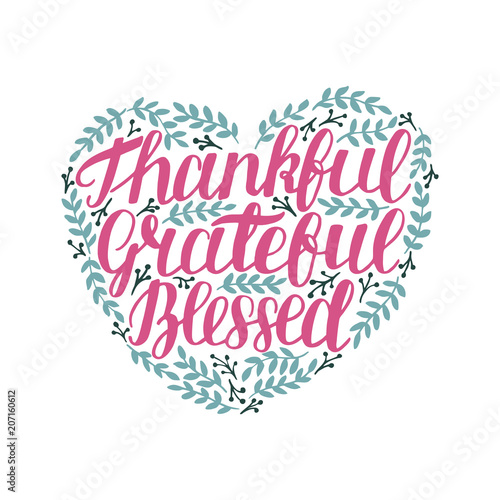 Hand lettering with motivational quote Thankful, grateful, blessed in shape of heart with leaves