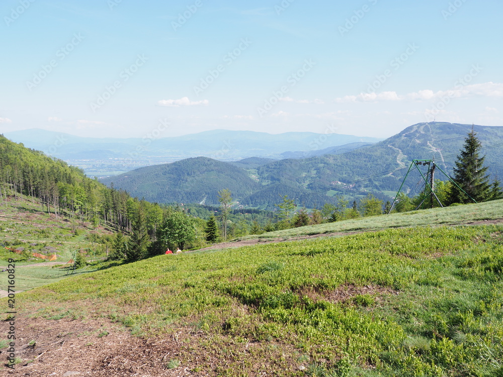 Naklejka premium Scenic view from Klimczok mount in Silesian Beskids Mountains range landscape near european Bielsko-Biala city in Poland