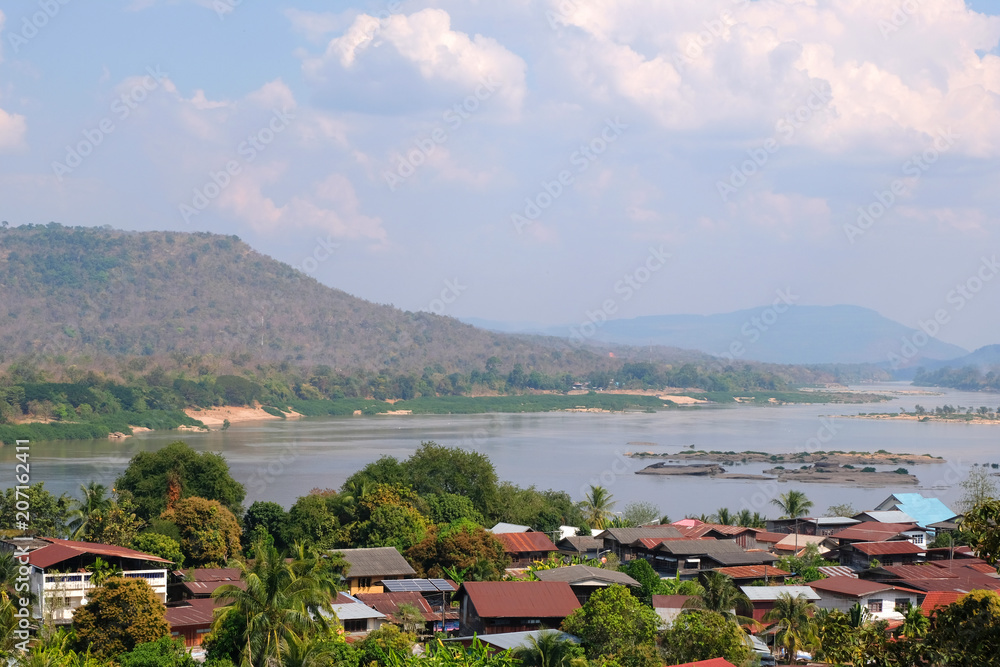 View of riverside village at Wat Tham Khuha Sawan in Khong Chiam, Ubon Ratchathani, Thailand