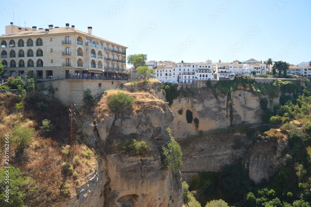 Beautiful Views Of The Gorge Of The Tagus In Its High Part We See The Hostel Of Ronda. August 4, 2016. Travel architecture holidays. Ronda Malaga Andalucia Spain.