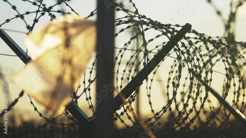 fence prison strict regime silhouette barbed wire. illegal immigration fence from refugees. illegal immigration concept prison prison fence lifestyle