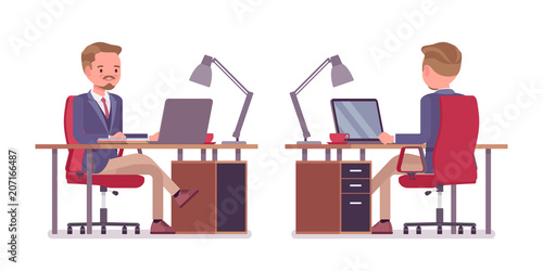 Male office secretary busy with computer work