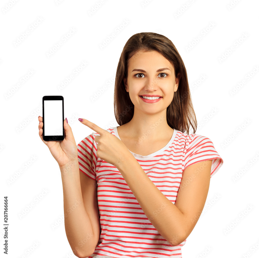 Happy beautiful young woman with long hair holding blank screen mobile phone and pointing finger. emotional girl isolated on white background Happy beautiful young woman with long hair holding blank screen mobile phone and pointing finger. emotional girl isolated on white background