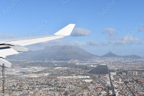 View over Cape Town by plane with the big Table Mountain, Signal Hill and Lions Head, South Africa photo