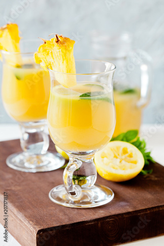 Glasses Of Refreshing Pineapple JuiceWith Mint And Lemon