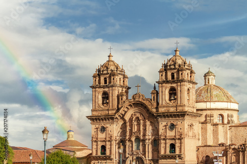 Portal Church of Belen with rainbow in front of the main square of Cusco (Peru)