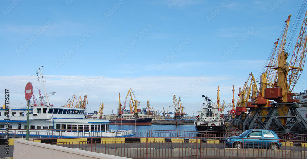 large cargo ships in the port with cranes