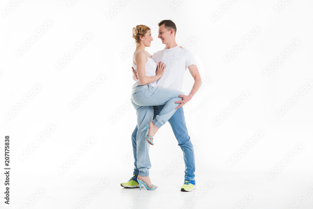 beauty couple dancing on grey background. beauty couple dancing on grey background.