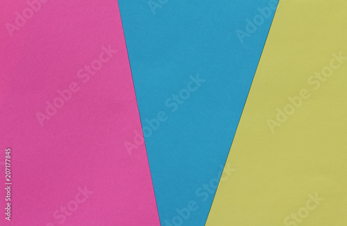 Creative geometric paper background. Pink, blue, yellow colors. Abstraction. Template.