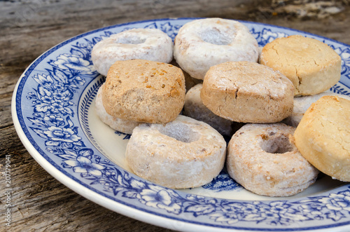 polvorones mantecados and roscos de vino in a blue plate photo