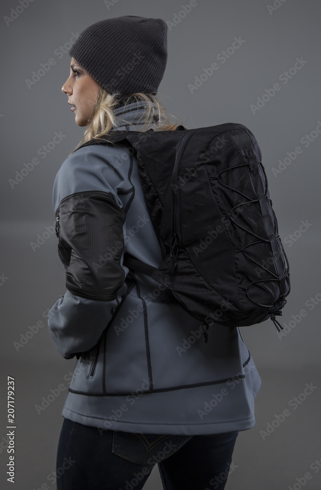 Woman survivalist about to go on a hike.