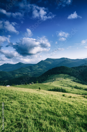 Carpathian mountains summer landscape with blue sky and clouds, natural outdoor background