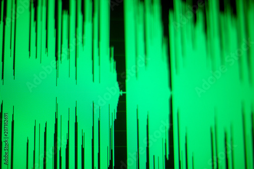 Computer screen with a green wave diagram on display - Spectrogram or waveform