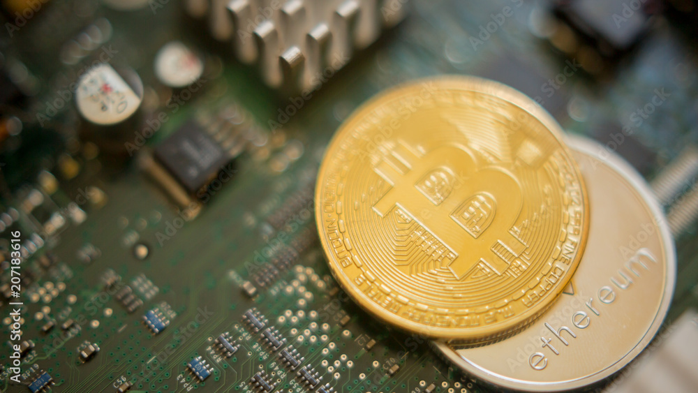 Bitcoin mining process - gold coin on computer circuit board with bitcoin processor and microchips. Electronic currency, internet finance rypto currency concept. Golden Bitcoin Cryptocurrency Bitcoin mining process - gold coin on computer circuit board with bitcoin processor and microchips. Electronic currency, internet finance rypto currency concept. Golden Bitcoin Cryptocurrency
