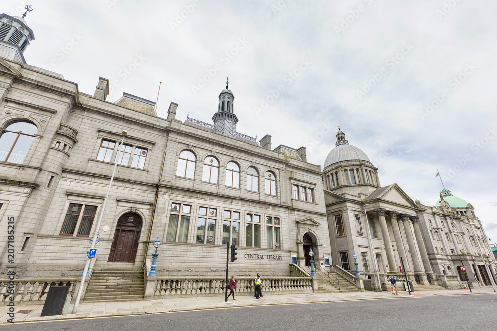 ABERDEEN, UNITED KINGDOM - AUGUST 3: Unidentified people in front of the Central Library in the city of Aberdeen, United Kingdom on August 3, 2016.