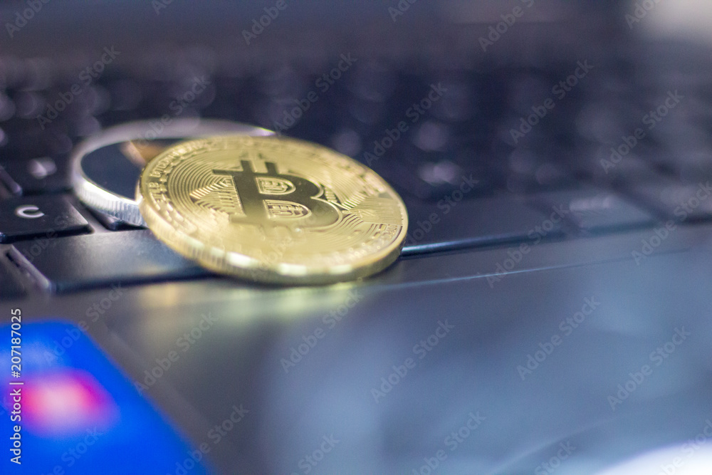 Metal Bitcoins and Ethereum coins. Bitcoin, Ethereum - modern virtual eletronic money