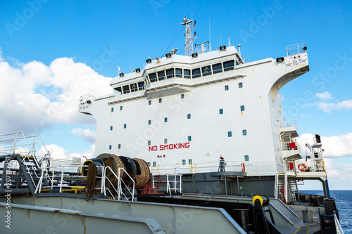 White superstructure of oil product tanker.