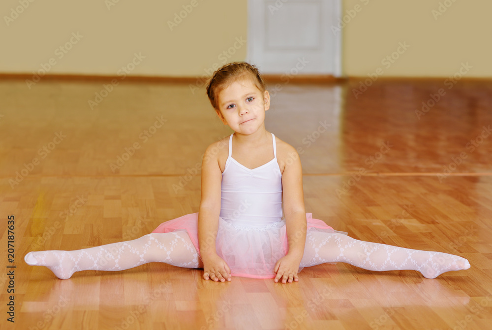 girl sitting in cross split girl sitting in cross split