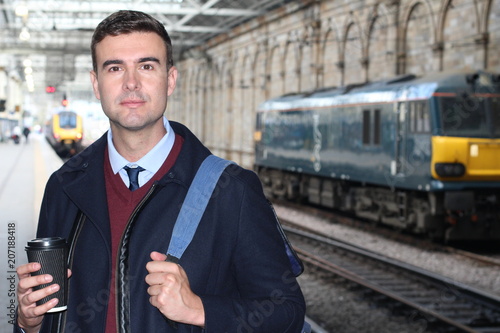 Wallpaper Mural Businessman walking in retro train station Torontodigital.ca