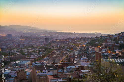 Beautiful viewpoint of Barcelona at sunrise, natural location in spring. © icephotography