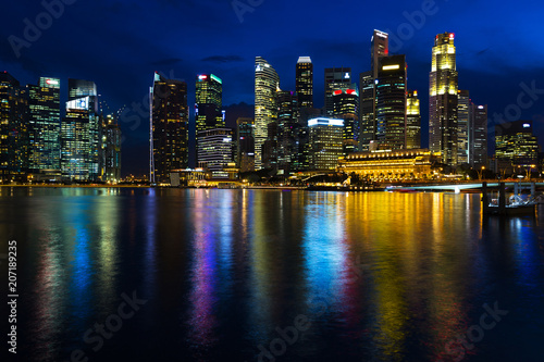 Landscape of the Singapore financial district and business buildings in lights at night
