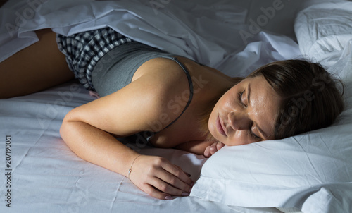 Sexy girl in pygamas sleeping in bed at home Stock Photo | Adobe Stock