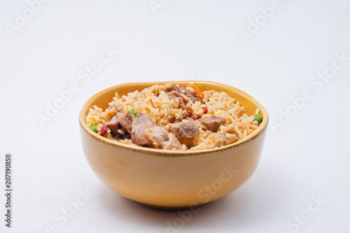 Isolated fried rice and teriyaki chicken on white background with room for copy text