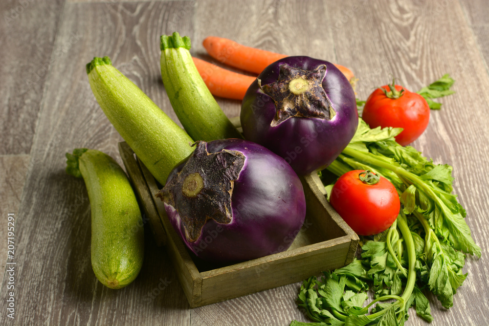 eggplant with other vegetables around eggplant with other vegetables around