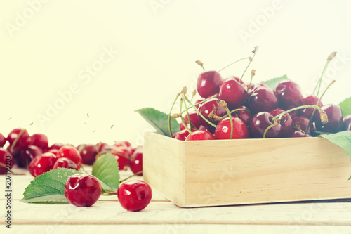 cherry in wooden container ...