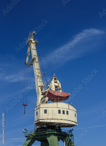 Heavy old crane at the Harbor. Riga, Latvia