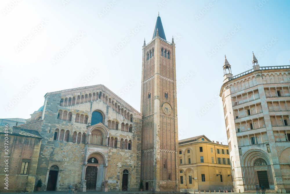 Parma, Emilia Romagna, Italy. Piazza Duomo with Cathedral, tower bell and Baptistery. Parma is famous for typical ham.