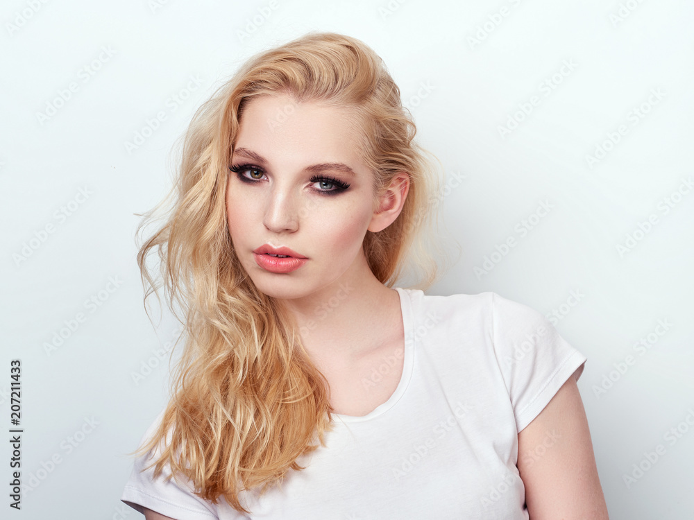 Beauty portrait of model with trendy natural make-up. Fashion shiny highlighter on skin, sexy gloss lips make-up. Beauty portrait of model with trendy natural make-up. Fashion shiny highlighter on skin, sexy gloss lips make-up.