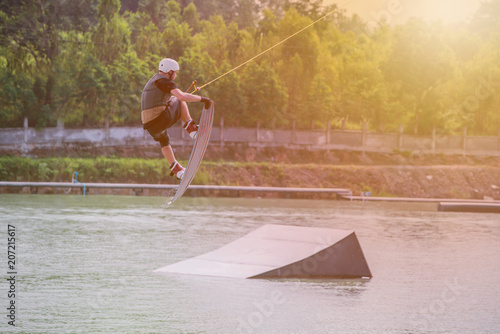 wakeboarding at the wake park. Outdoor and extreme sport. photo