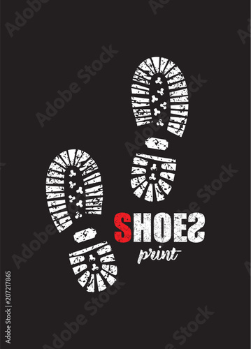 Shoe print on black background 