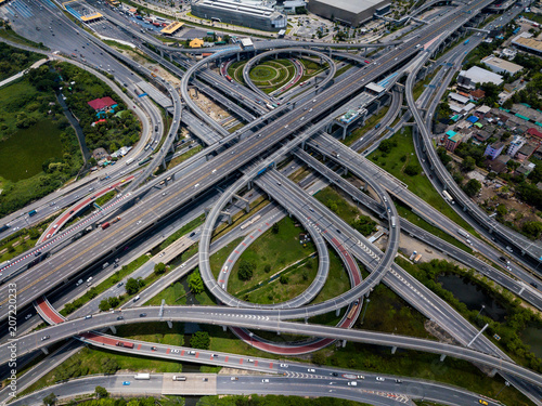 Top view of Highway road junctions. The Intersecting freeway road overpass the eastern outer ring road of Bangkok, Thailand. © Travel man