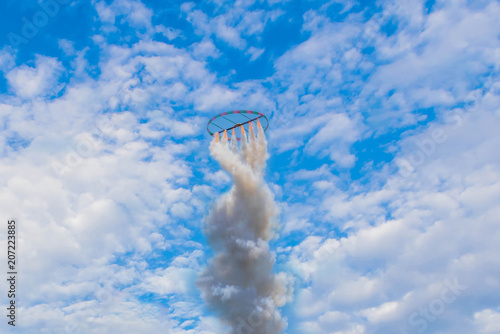 Abstract soft focus Thailand fireball skyrocket, circle fireball rocket taking off to the sky, The community rocket festival at Kalasin Province, Thailand. photo