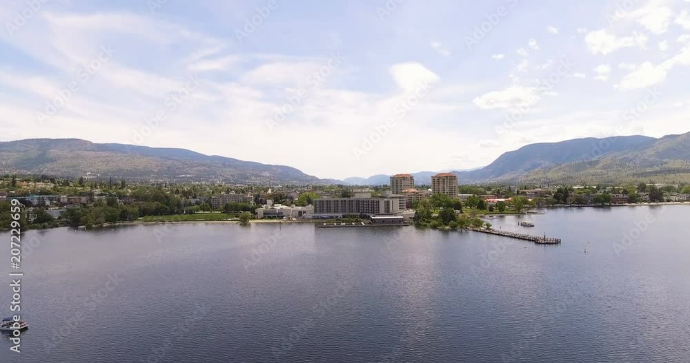 Slow Reveal Shot of Center of Small Canadian Town from the Lake Front Slow Reveal Shot of Center of Small Canadian Town from the Lake Front
