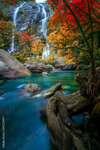 Fototapeta Naklejka Na Ścianę i Meble -  Beautiful Khlong Lan waterfall  autumn forest  Kamphaeng Phet Province. Khlong Lan National Park, Thailand