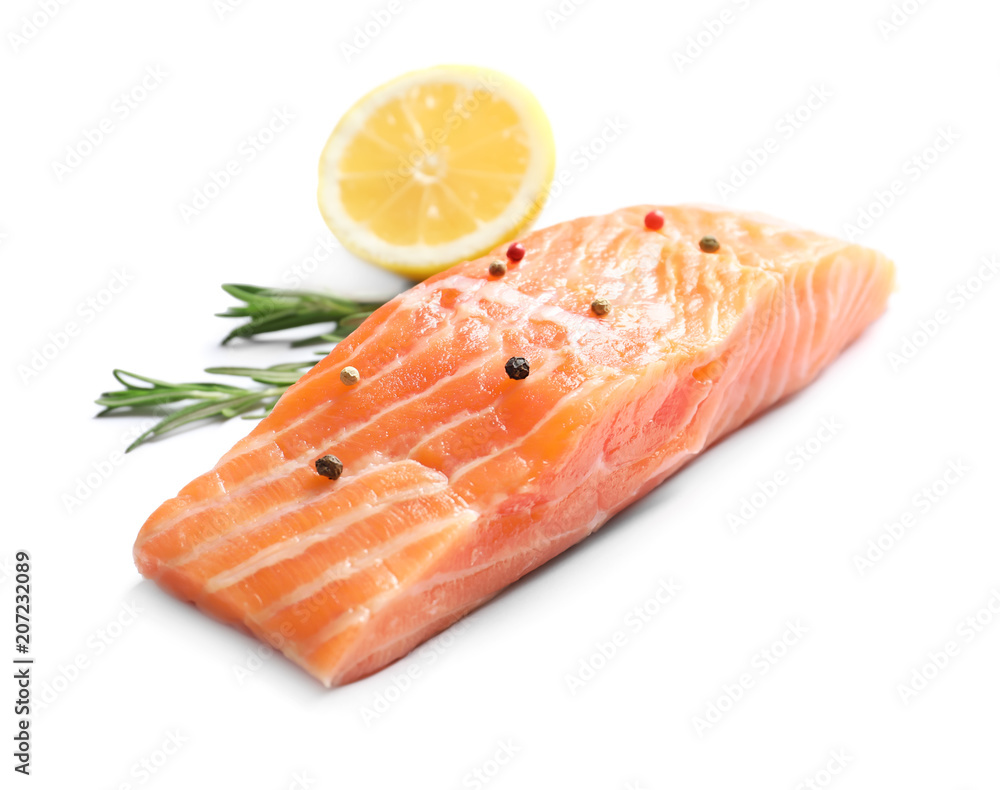 Fresh salmon with rosemary and lemon on white background