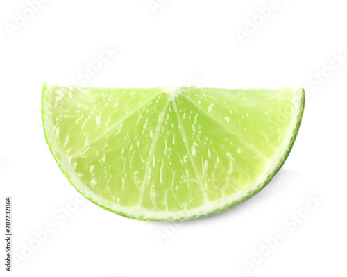 Slice of fresh ripe lime on white background