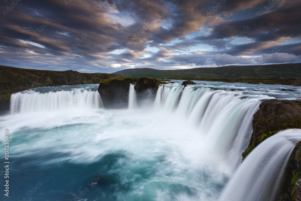 Godafoss waterfall. / Beautiful nature water landscape in volcanic Iceland