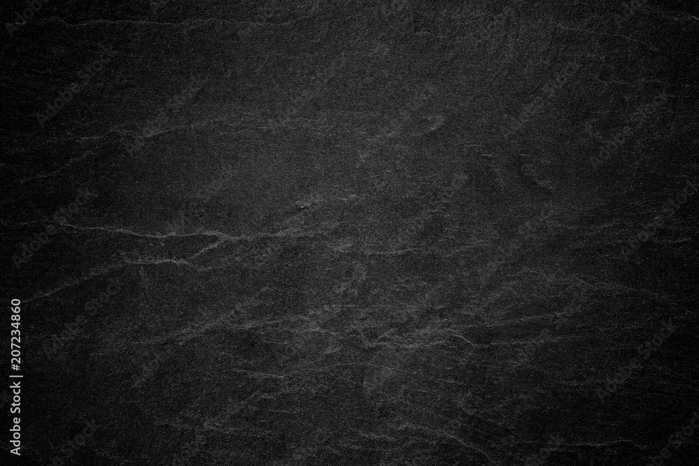 Dark grey black slate background or natural stone texture. Dark grey black slate background or natural stone texture.